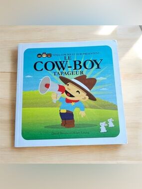 3/$22 Scholastic Le cow-boy tapageur 2011 French Edition Soft Cover Kids Book